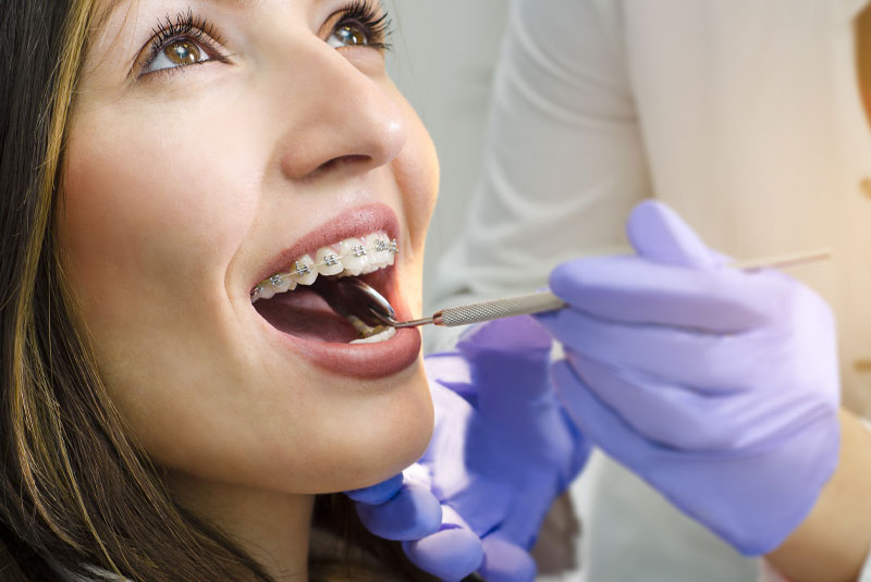 dental braces patient undergoing procedure